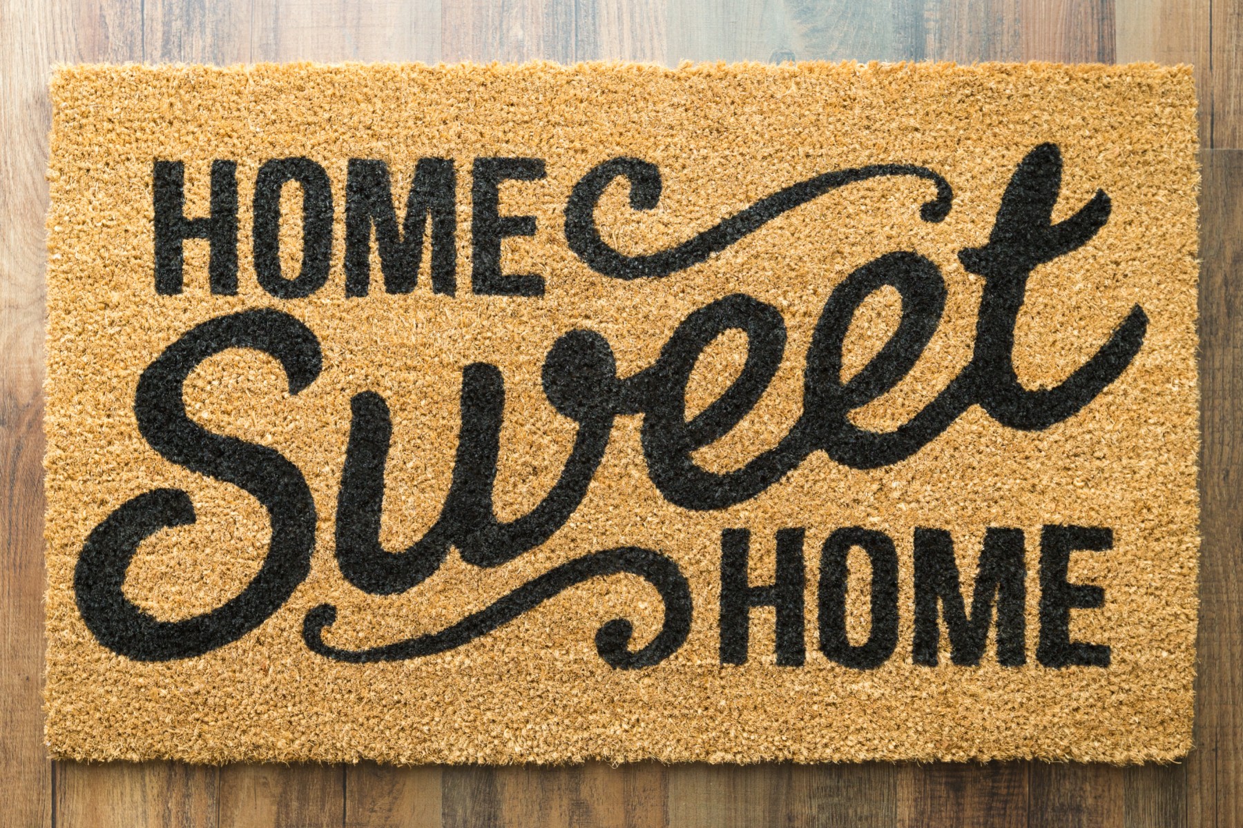 Welcome mat that reads Home Sweet Home