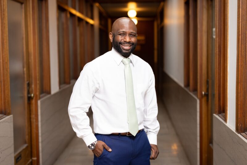 Banker in hallway wearing a suit